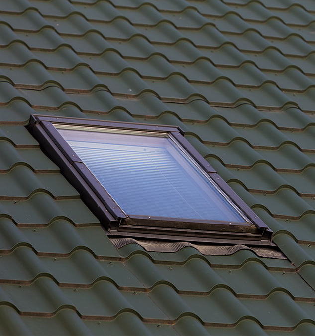 close-up-detail-new-small-attic-plastic-window-installed-dark-green-shingled-house-roof