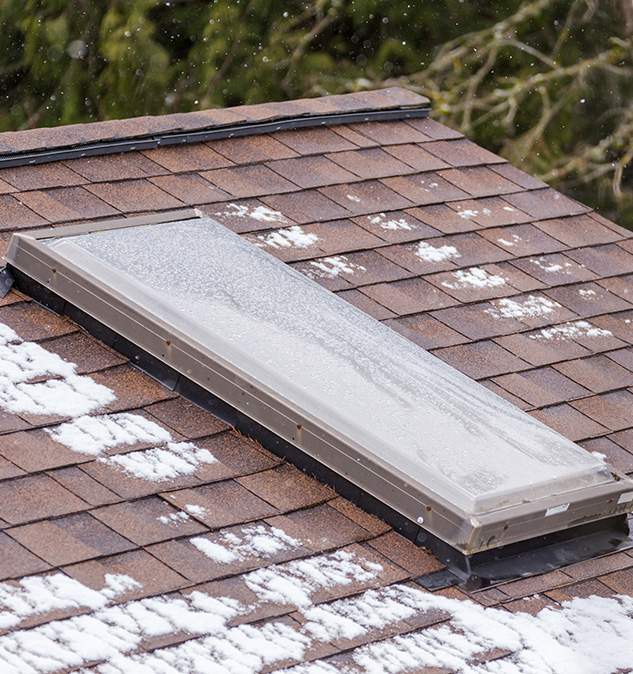 roof-sky-light-with-snow-shingles-nearby